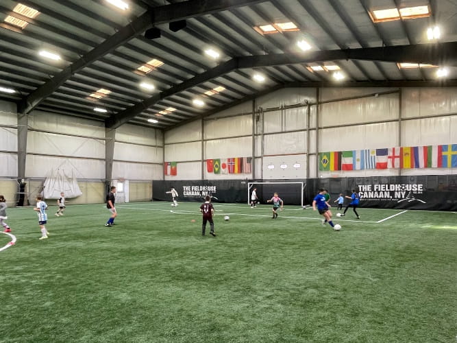 Photo of kids practicing on field